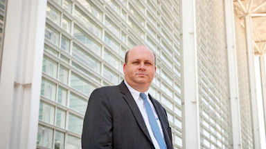 A photograph of attorney Marc Elias outside of Sandra Day O'Connor United States Courthouse in Phoenix, AZ,