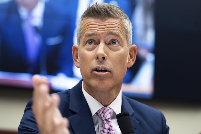 Transportation Secretary Sean Duffy gestures while testifying in a House committee hearing