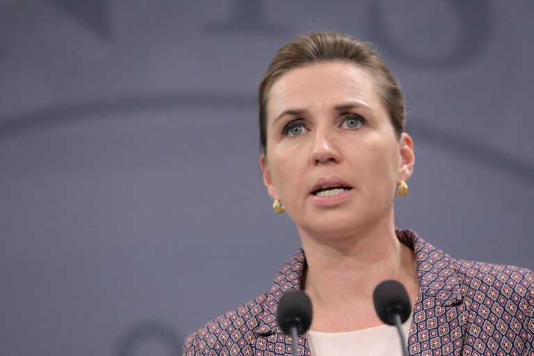 Danish Prime Minister Mette Fredericksen looks concerned during a press conference