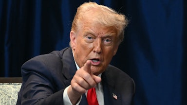 Donald Trump points while speaking