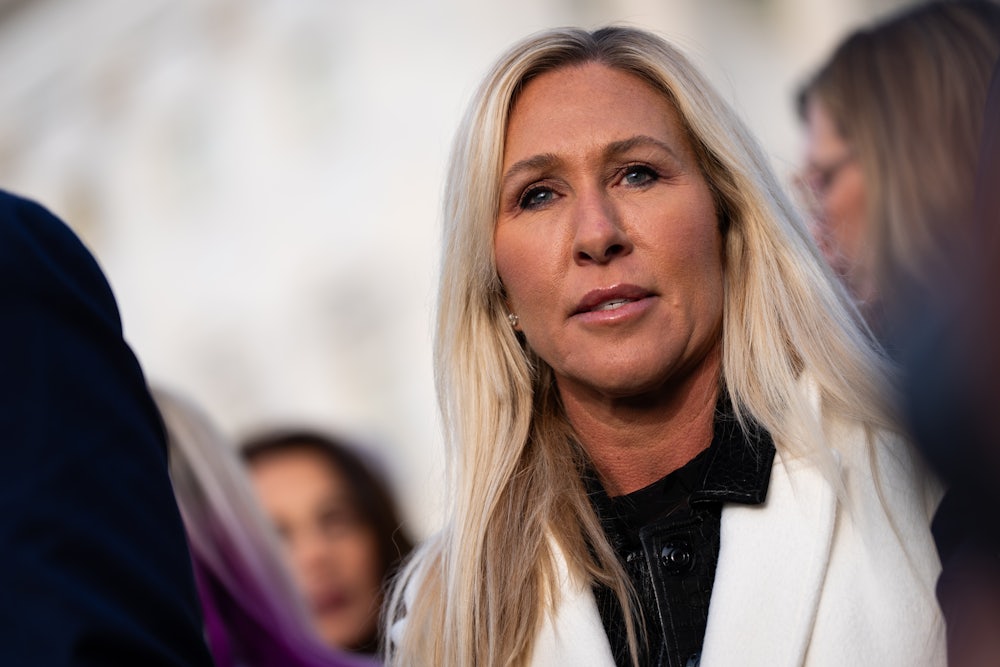Republican Representative Marjorie Taylor Greene speaks at a rally.