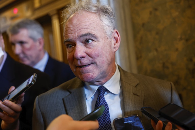 Sen. Tim Kaine speaks to reporters during a vote in the Senate Chambers of the U.S. Capitol Building on January 25, 2024 in Washington, DC.