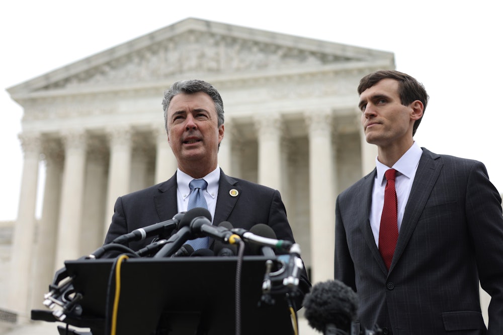Steve Marshall speaks at a podium in front of the Supreme Court building.