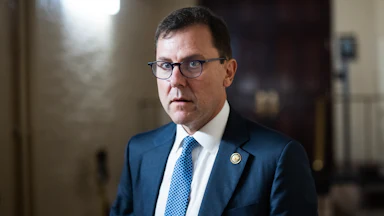 Representative Tom Kean Jr. walks in the Capitol