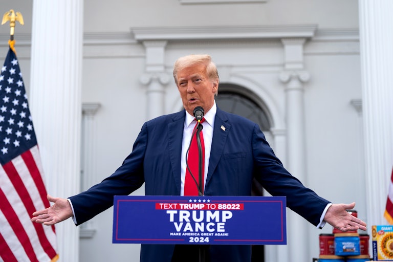 Donald Trump gestures as he speaks during a press conference at his Bedminster golf club.