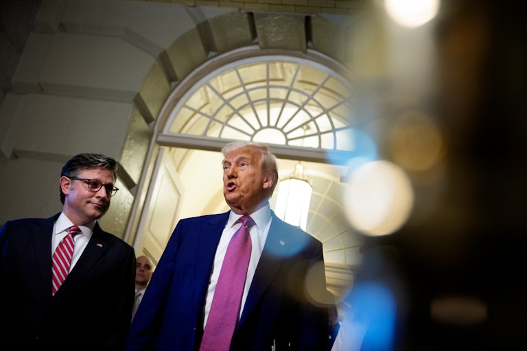 President Donald Trump, accompanied by Speaker of the House Mike Johnson.