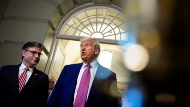 President Donald Trump, accompanied by Speaker of the House Mike Johnson.