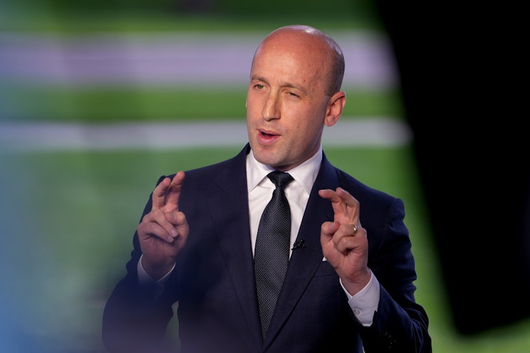 Stephen Miller gestures while speaking