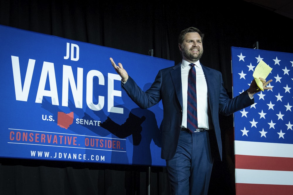J.D. Vance celebrates after winning the Republican primary