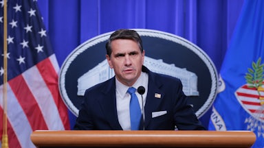 Deputy Attorney General Todd Blanche speaks at a podium