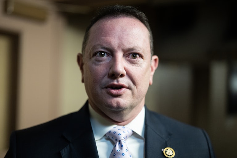 Representative Eric Burlison speaks to reporters