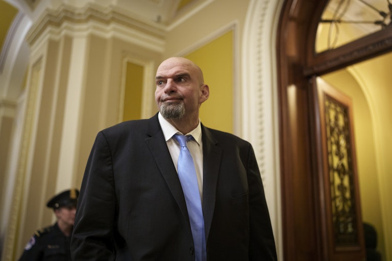 John Fetterman wears a suit in the Senate