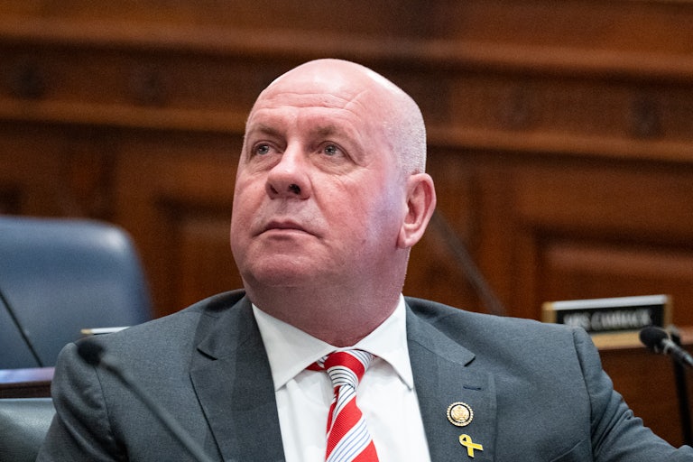 Representative Dave Taylor sits in a House committee hearing