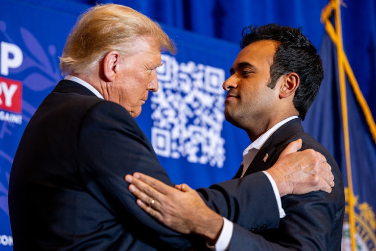 Donald Trump and Vivek Ramaswamy hug while greeting each other