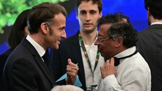 France’s President Emmanuel Macron talks with Colombia’s President Gustavo Petro during the COP30 UN Climate Change Conference.