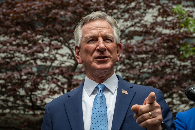 Tommy Tuberville points as he speaks