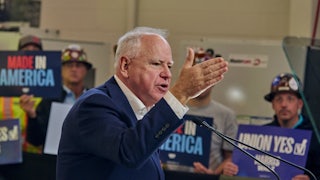 Democratic vice presidential candidate Tim Walz speaks at Macomb County Community College Robert E. Turner Advanced Technology Center in Warren, Michigan.