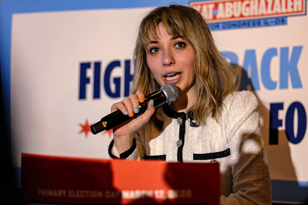 A photograph of Kat Abughazaleh speaking to supporters in Chicago after her loss in the Illinois Democratic primary election on Tuesday