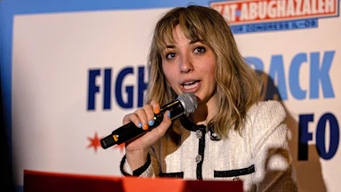 A photograph of Kat Abughazaleh speaking to supporters in Chicago after her loss in the Illinois Democratic primary election on Tuesday
