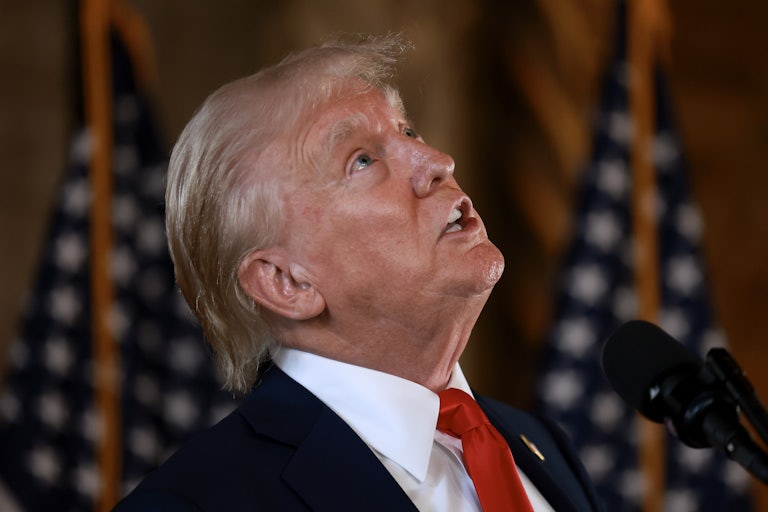 Donald Trump looks up during a press conference at Mar-a-Lago