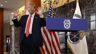 Donald Trump holds up his hands after being asked about them by reporters at the International Brotherhood of Teamsters headquarters on January 31, 2024 in Washington, DC.