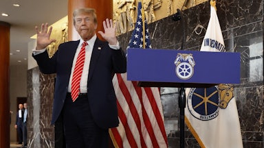 Donald Trump holds up his hands after being asked about them by reporters at the International Brotherhood of Teamsters headquarters on January 31, 2024 in Washington, DC.