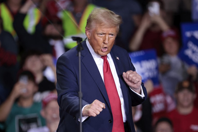 Donald Trump dances on stage