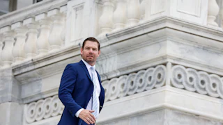 Representative Eric Swalwell on the steps of the Capitol