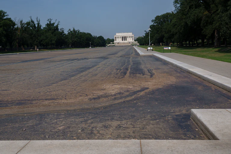 The Lincoln Memorial stands behind the recently drained Lincoln Memorial Reflecting Pool on July 15.