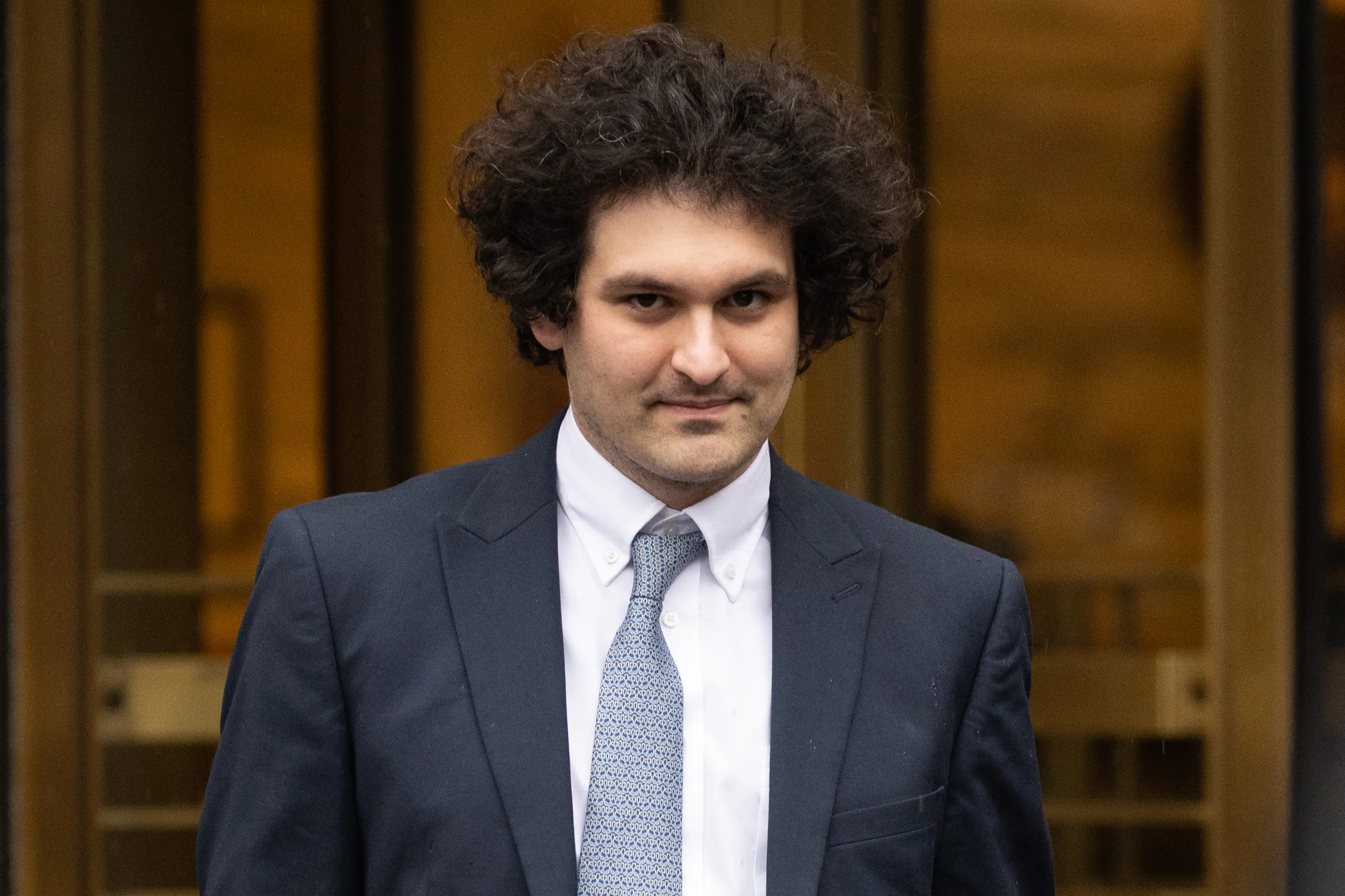 Sam Bankman-Fried does the dumb smirk he does
