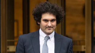 Sam Bankman-Fried does the dumb smirk he does