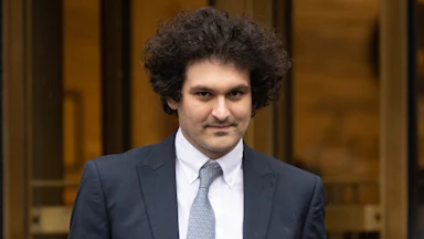 Sam Bankman-Fried does the dumb smirk he does