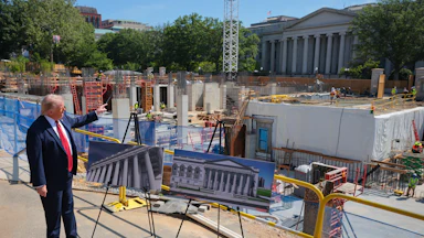 Trump in front of ballroom construction