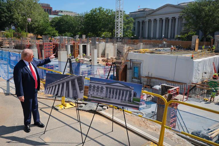 Trump in front of ballroom construction