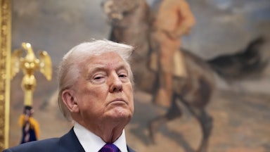 Donald Trump looks down and subdued