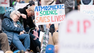 On May 1, demonstrators in Boulder staged a “die-in” near the entrance to the National Oceanic and Atmospheric Administration and the National Institute of Standards and Technology to show their support for federal science agencies. One sign reads "Atmospheric science saves lives."