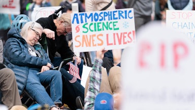 On May 1, demonstrators in Boulder staged a “die-in” near the entrance to the National Oceanic and Atmospheric Administration and the National Institute of Standards and Technology to show their support for federal science agencies. One sign reads "Atmospheric science saves lives."