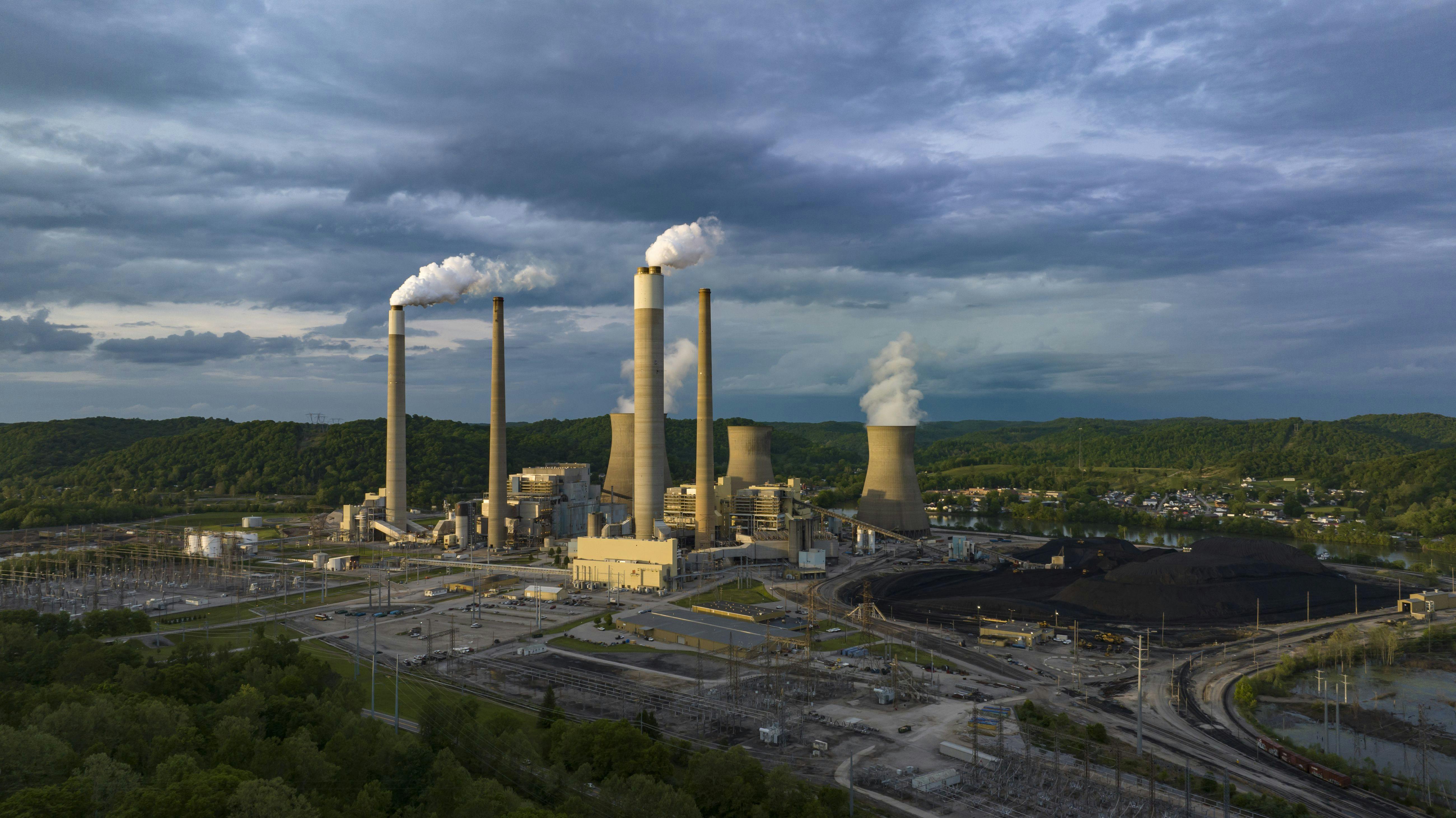 Smoke pours from chimneys at the Jon Amos Power plant in Poca, West Virginia.