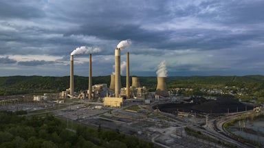 Smoke pours from chimneys at the Jon Amos Power plant in Poca, West Virginia.