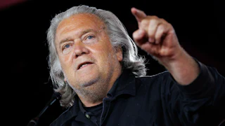 Steve Bannon points while speaking at CPAC