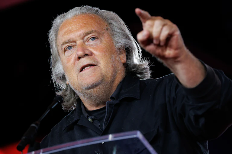 Steve Bannon points while speaking at CPAC