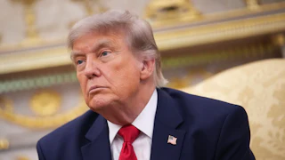 Donald Trump frowns glumly