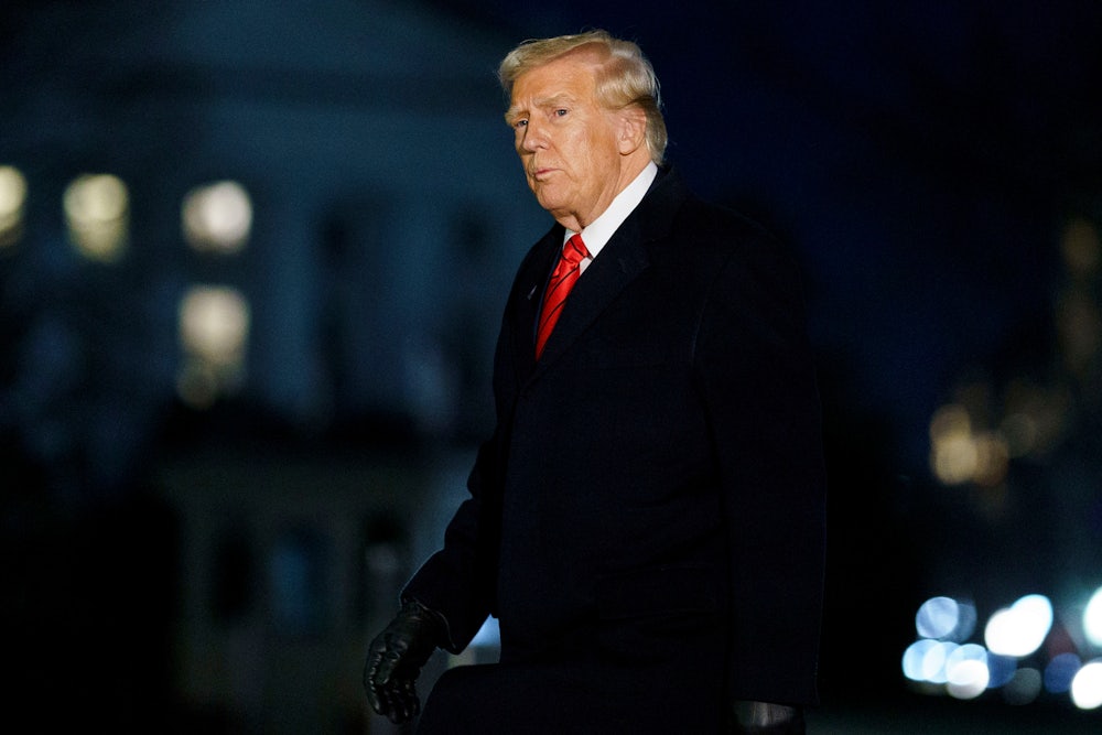 Donald Trump walks on the South Lawn of the White House after arriving on Marine One in Washington, D.C.