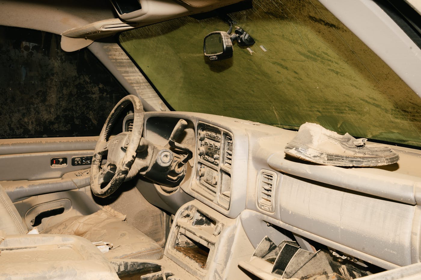 The ghostly interior of a debris-covered car abandoned near Biltmore Village, Asheville