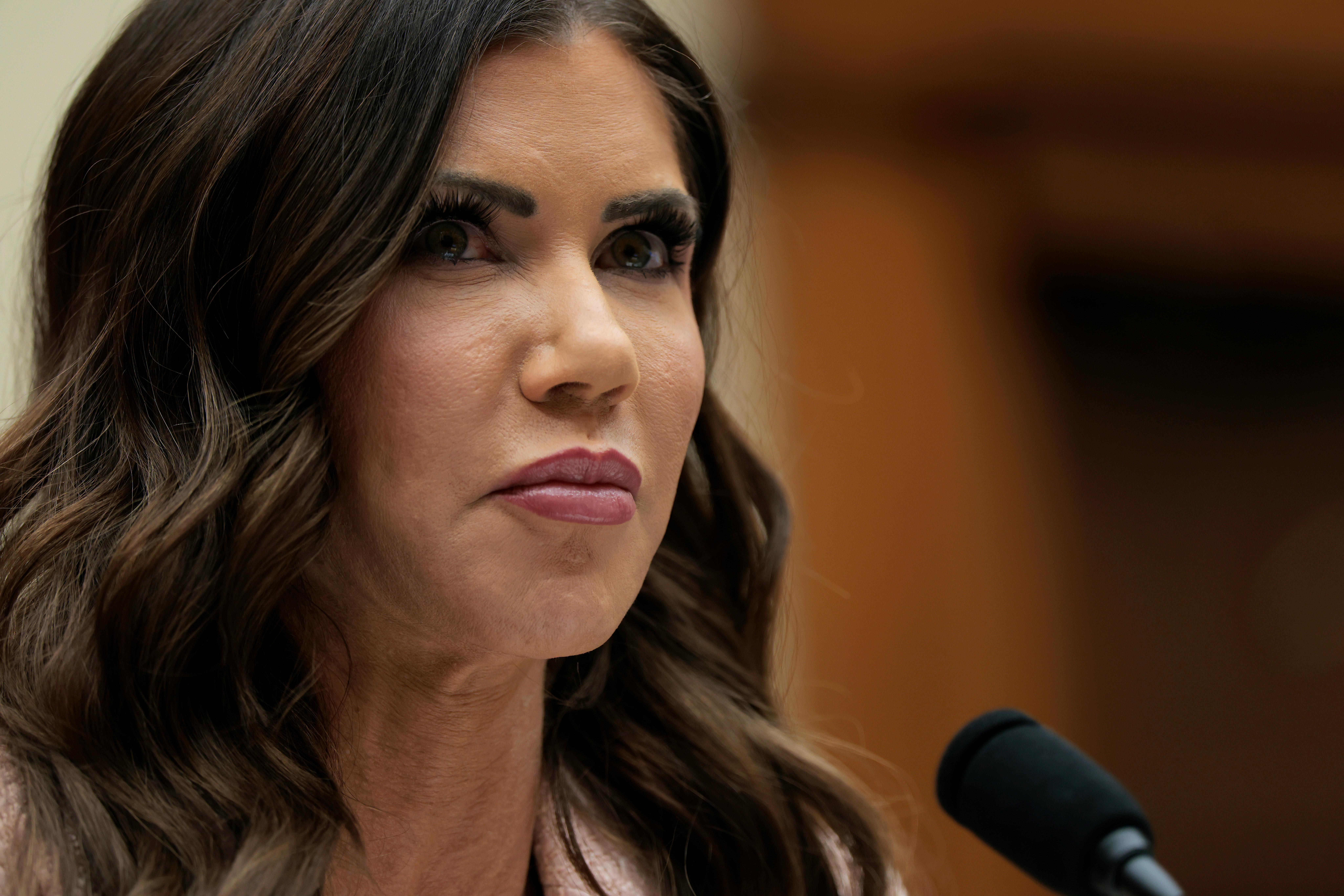 Kristi Noem frowns while sitting in a House Judiciary Committee hearing