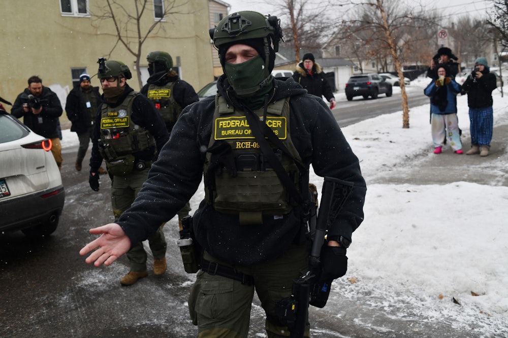 Federal agents patrol the Frogtown neighborhood of Minneapolis while anti-ICE activists warn the community about their presence.