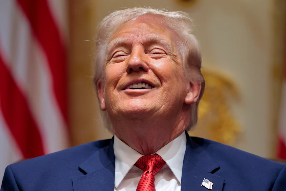 President Trump smiles in a Cabinet meeting