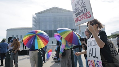 Demonstrators in support of LGBTQ+ rights and against book bans outside the U.S. Supreme Court