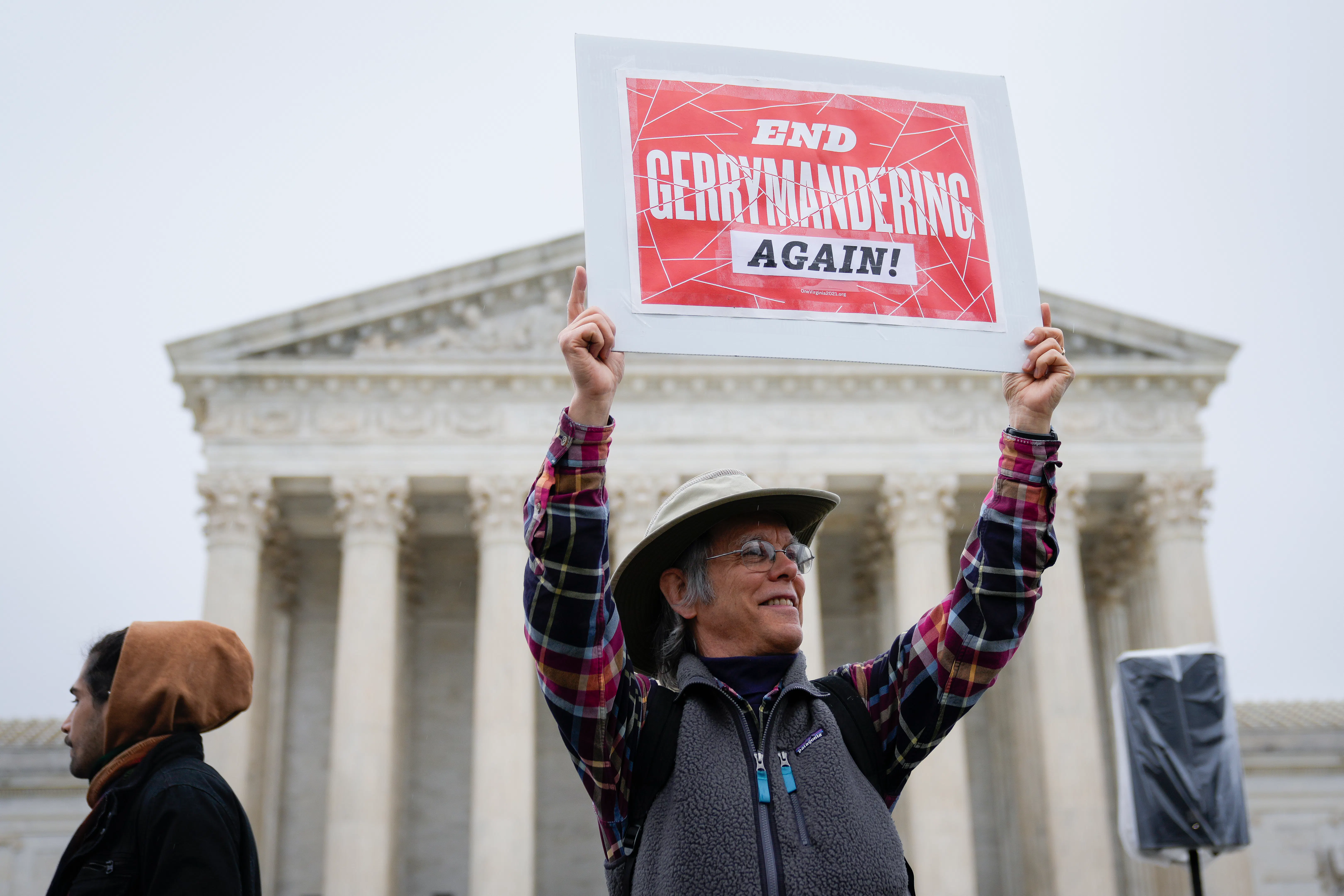 Voting rights activists rally outside the U.S. Supreme Court.