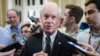 Wisconsin Senator Ron Johnson talks with reporters after the senate luncheons in the U.S. Capitol.
